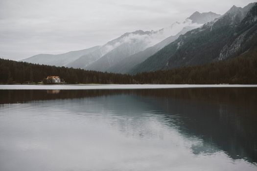 Scenic Landscape of the Lake with a Mountain Range in the Background 