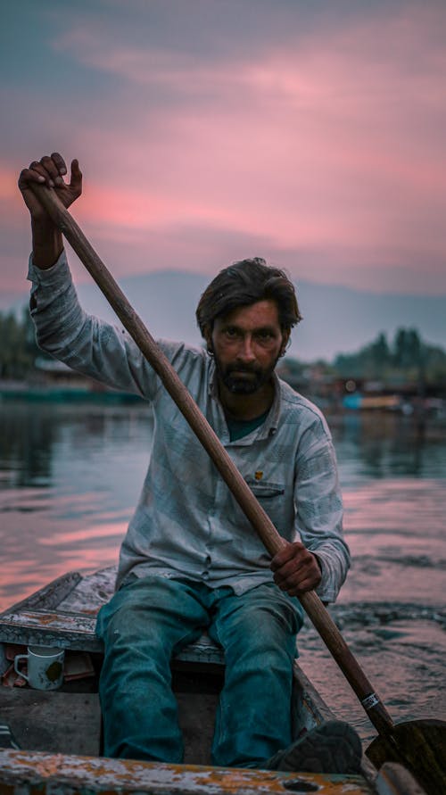 A Man Rowing a Boat