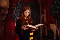 A Girl Studying a Book of Wizardry