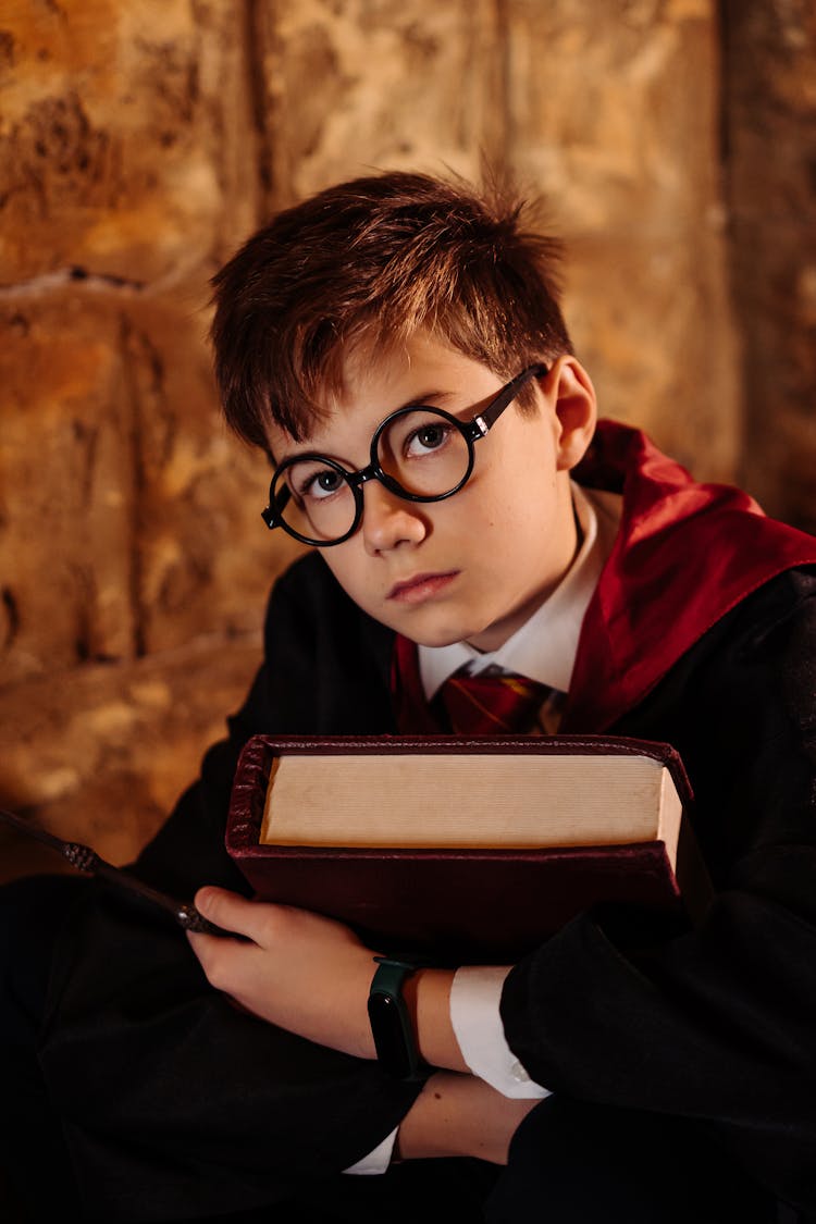 A Boy Cosplaying Harry Potter