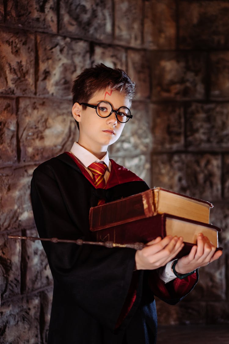 A Boy Cosplaying As Harry Potter