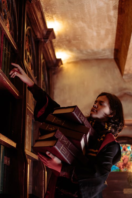 Boy with Spellbooks