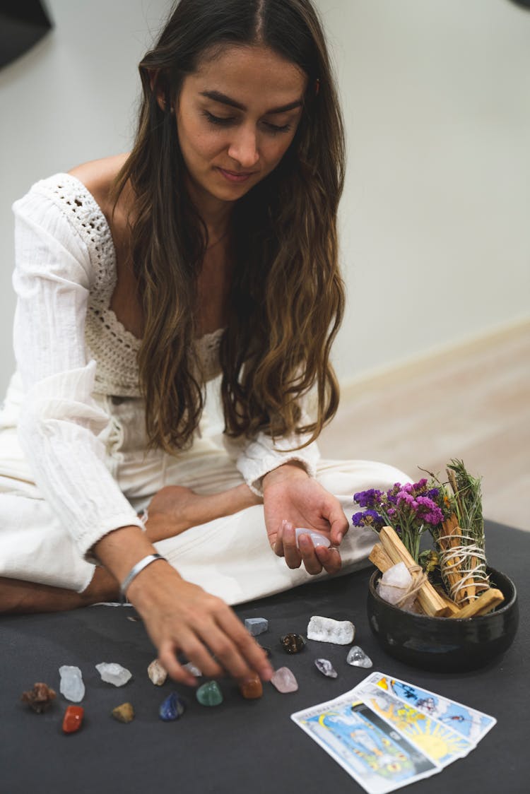 Woman Arranging Stones