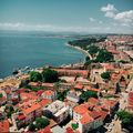 Aerial view of a coastal city, photo by Yunus Tuğ on Pexels