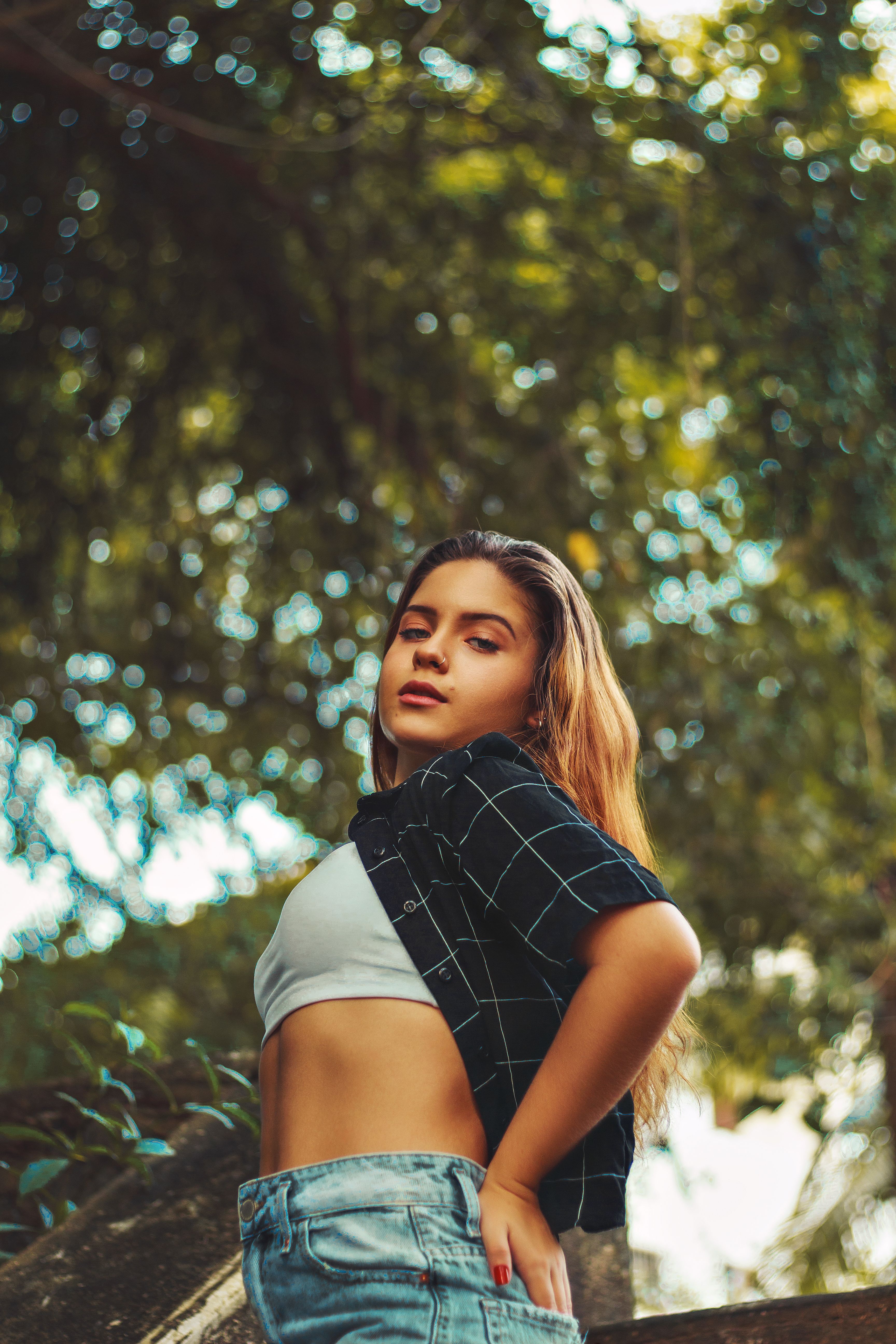 Woman Wearing Red Swimsuit Posing at the Waterfalls · Free Stock Photo