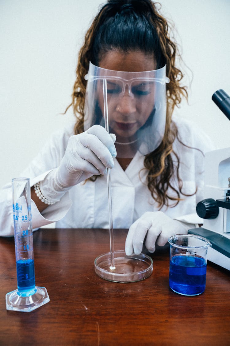 A Woman Scientist Working In A Laboratory
