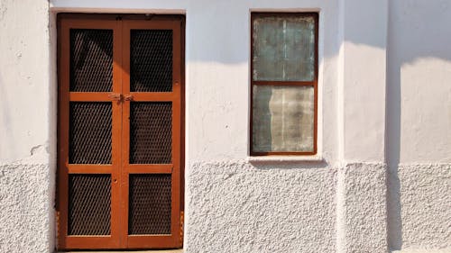 Brown Door on a White Structure