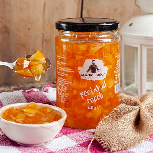 Orange Jam on a Glass Container