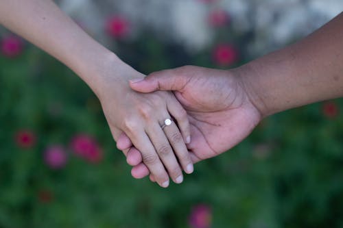 Close-up Shot of a Couple's Hands