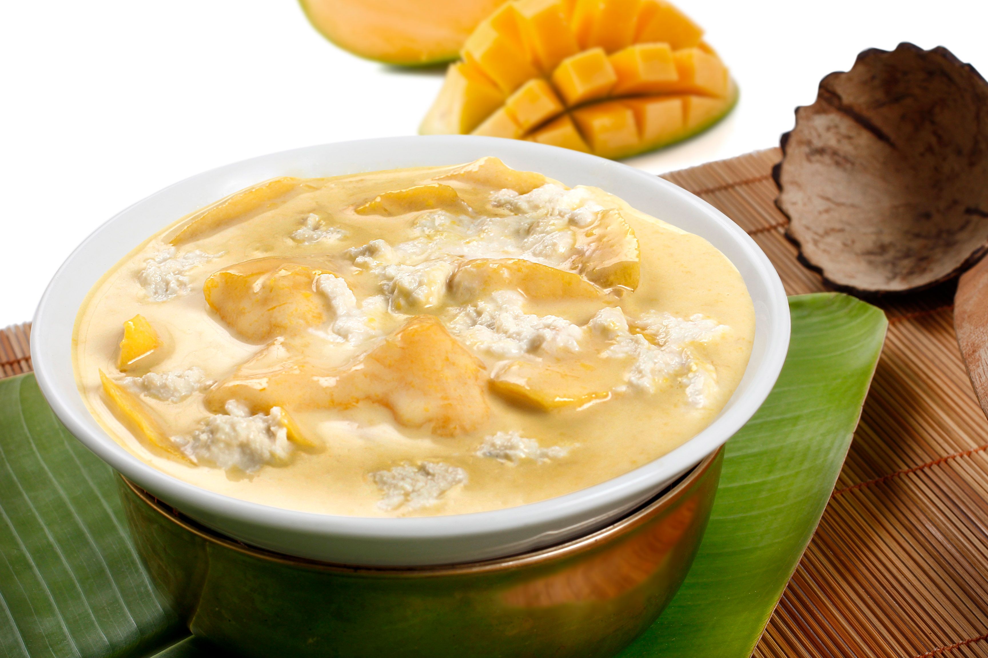 Creamy mango dessert served in a traditional bowl with distinct tropical flavors.