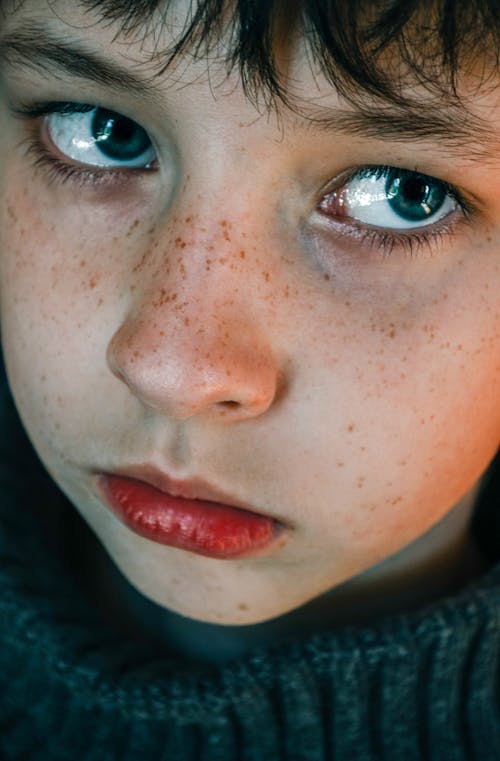 Free Close-up of a Boy's Face Stock Photo