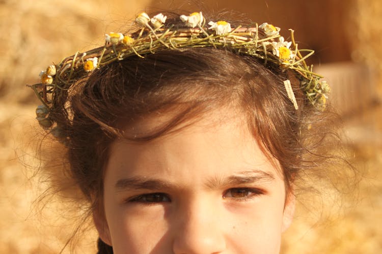 A Girl Wearing Crown Floral Wreath