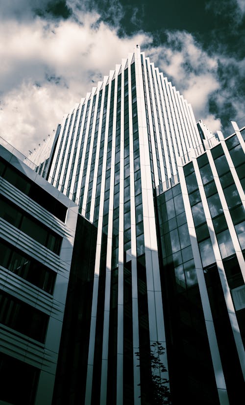 Free Low Angle Shot of a Modern Office Building Stock Photo