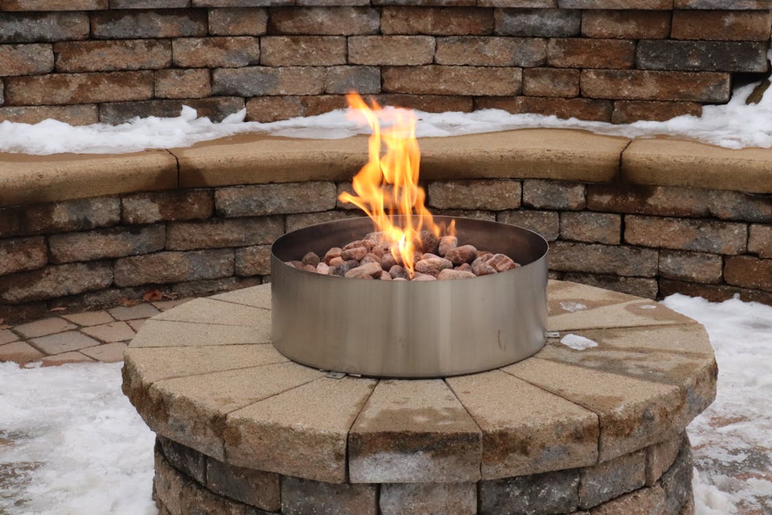 Free Concrete Bench Around a Fire Pit Stock Photo
