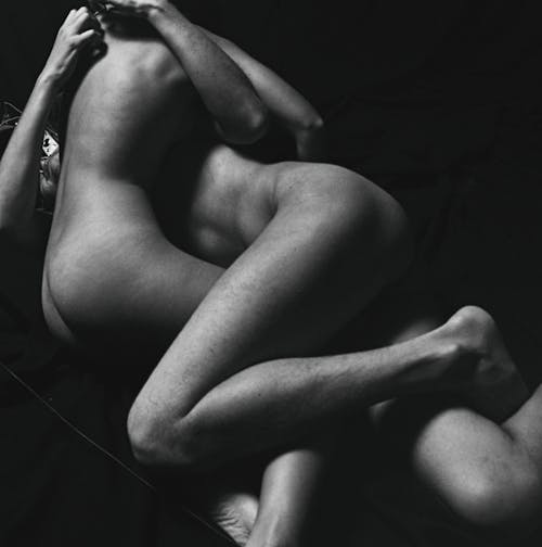 Grayscale Photo of Naked Couple