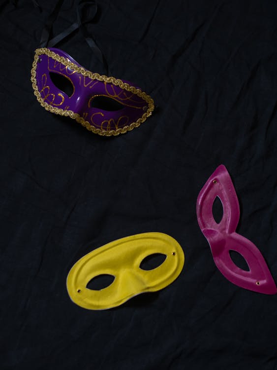 Mask With Masquerade Decorations On Dark Background Stock Photo
