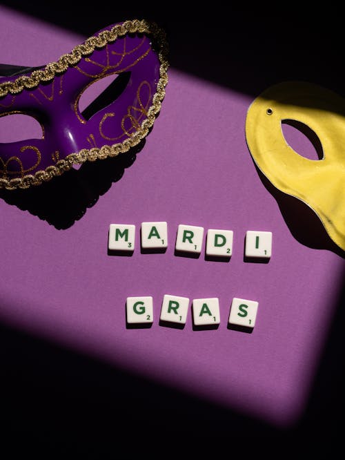 Masks with Scrabble Tiles on Purple Textile