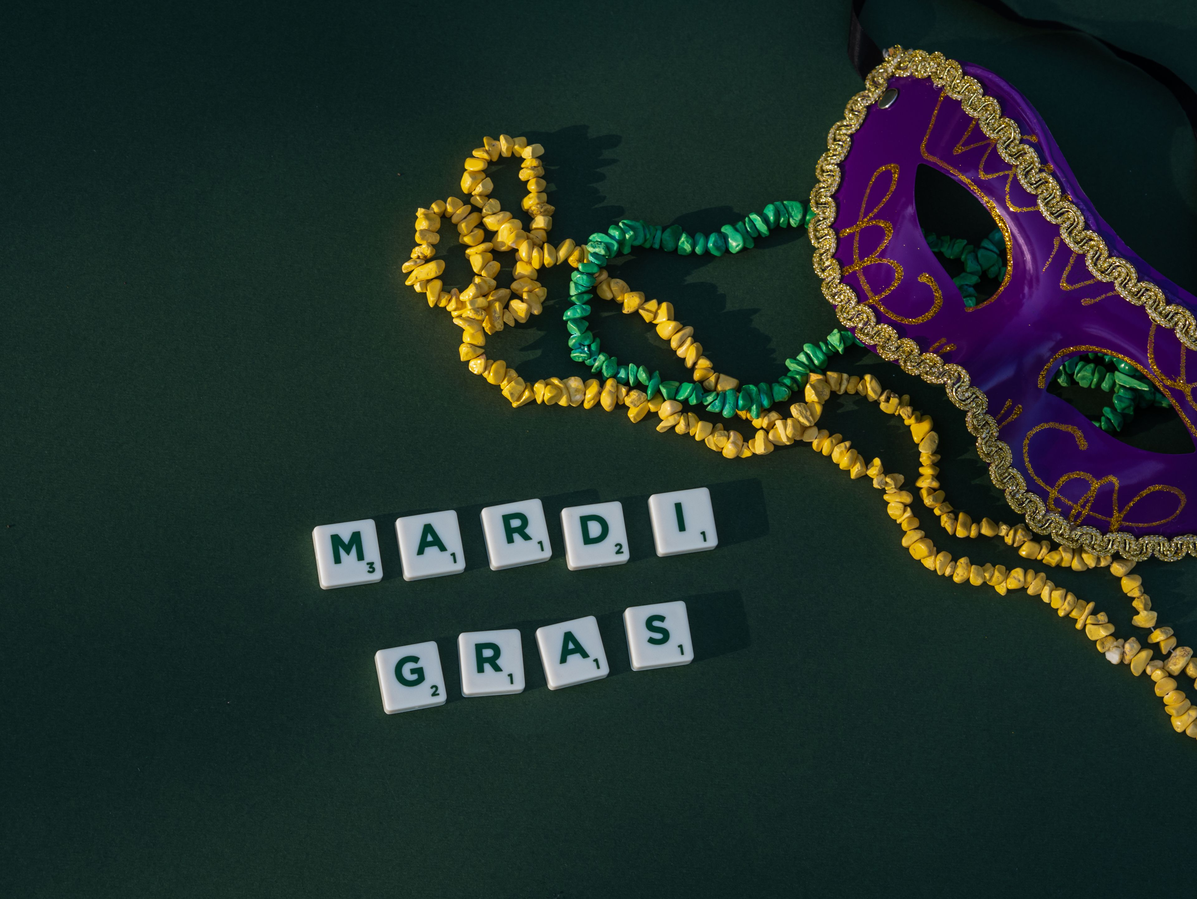Mardi Gras parade float beads crowd