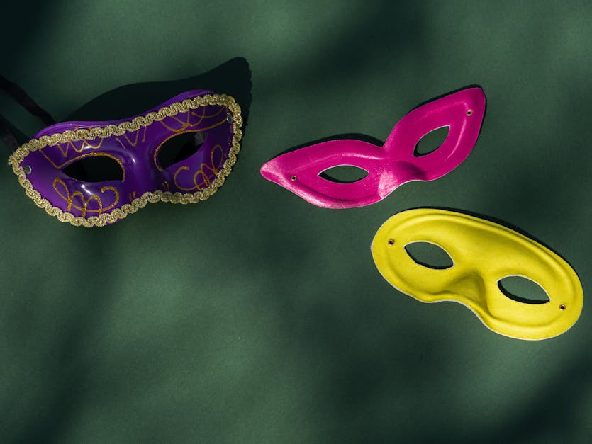 Premium PSD  Two pink and yellow theatrical masks with different characters