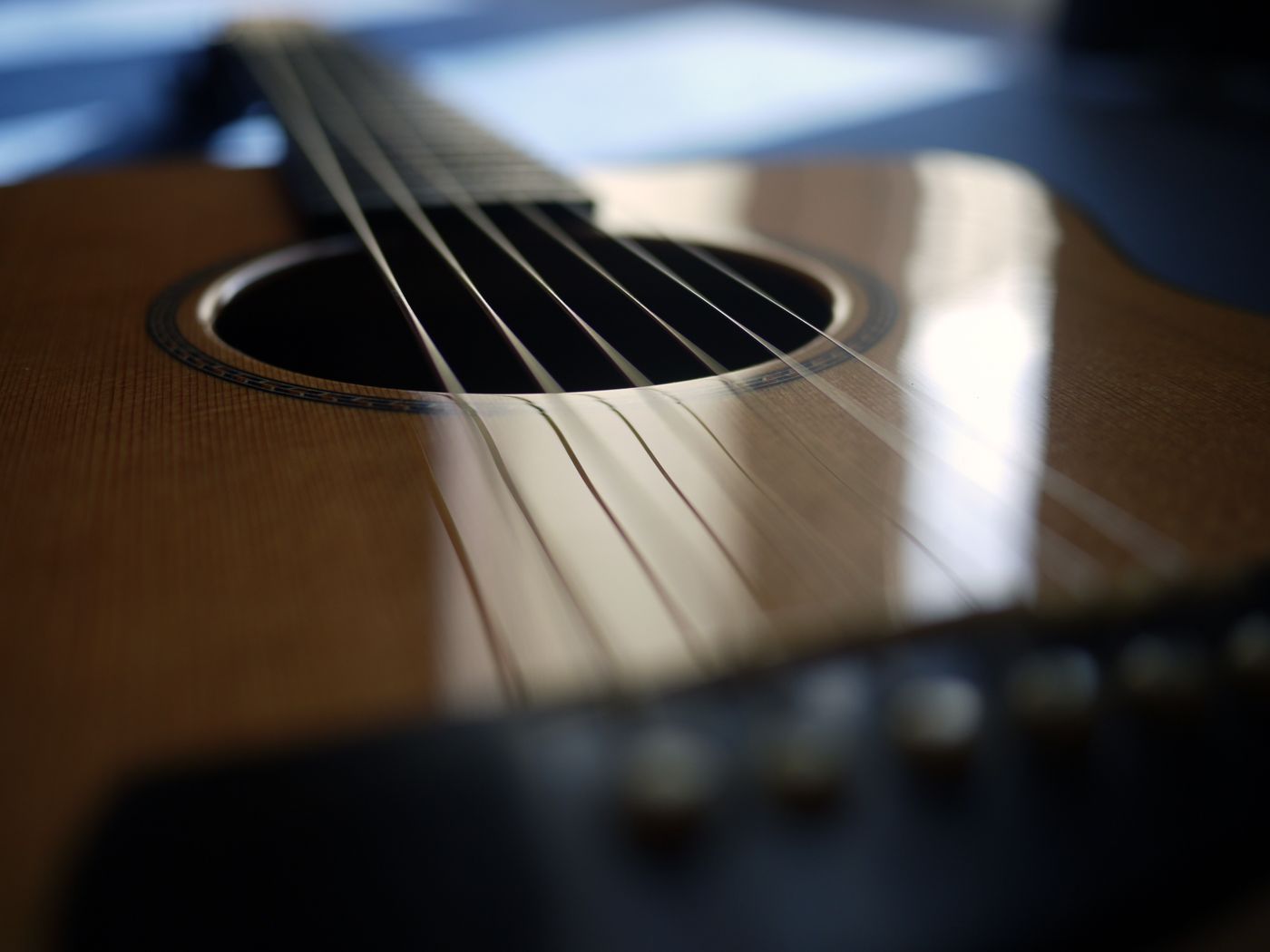 Close-up photo of an acoustic guitar