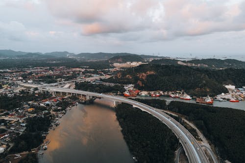 Aerial View of City and Bridge
