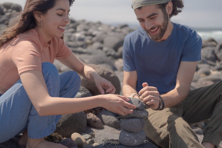 A Couple Balancing Rocks On The Shore