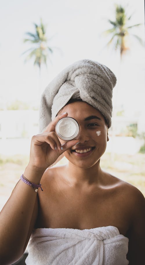 Woman Holding Facial Cream