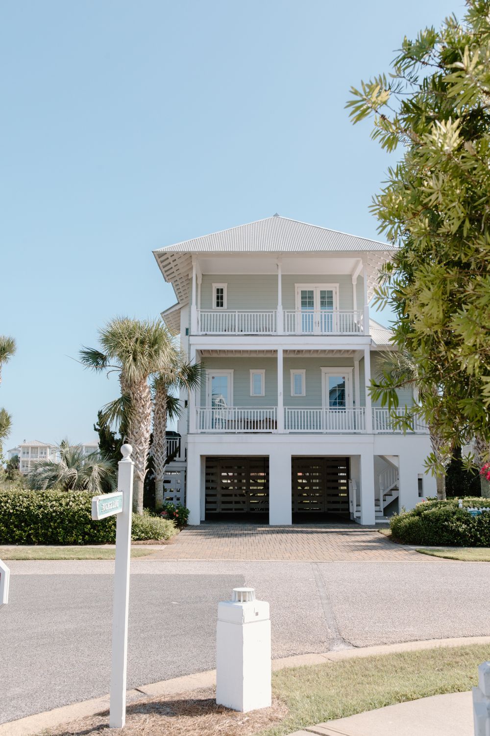 Clean coastal home prepared for roof painting and protection