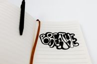 Black Pen on White Ruled Paper