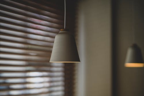 Free Selective Focus Photograph of a Hanging Electric Light Stock Photo