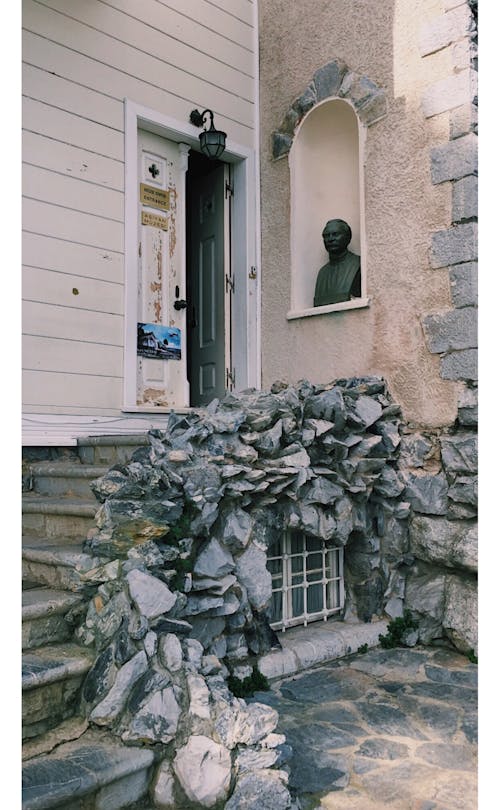 A Stone Sculpture Near Doorway