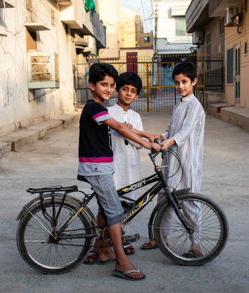 Boy Riding a Bicycle