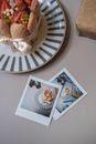 White Wooden Picture Frame on White Round Table