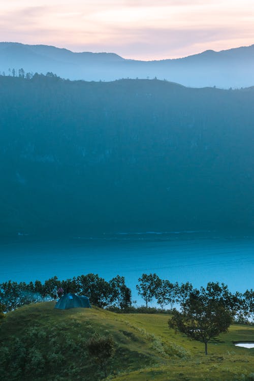 Camping on a Hill Top Near a Lake
