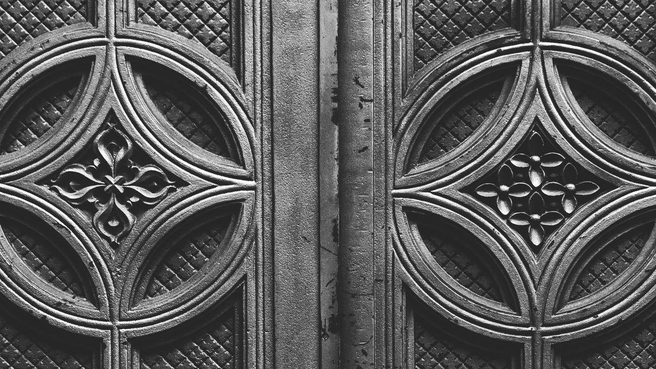 detailed close up of an ornate door design showcasing intricate patter