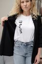 Woman in White Crew Neck Shirt and Black Jacket