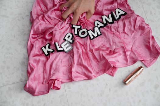 Letters on Top of a Pink Fabric