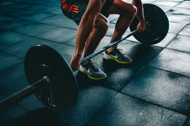 Lifting a barbell from the floor