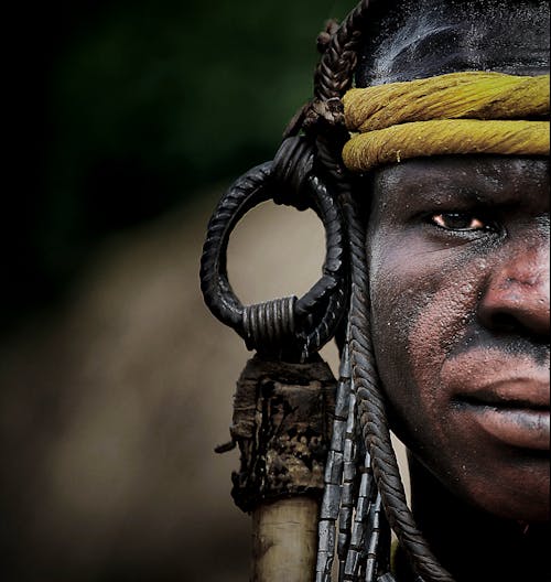 Close-up Photo of Man with Face Paint