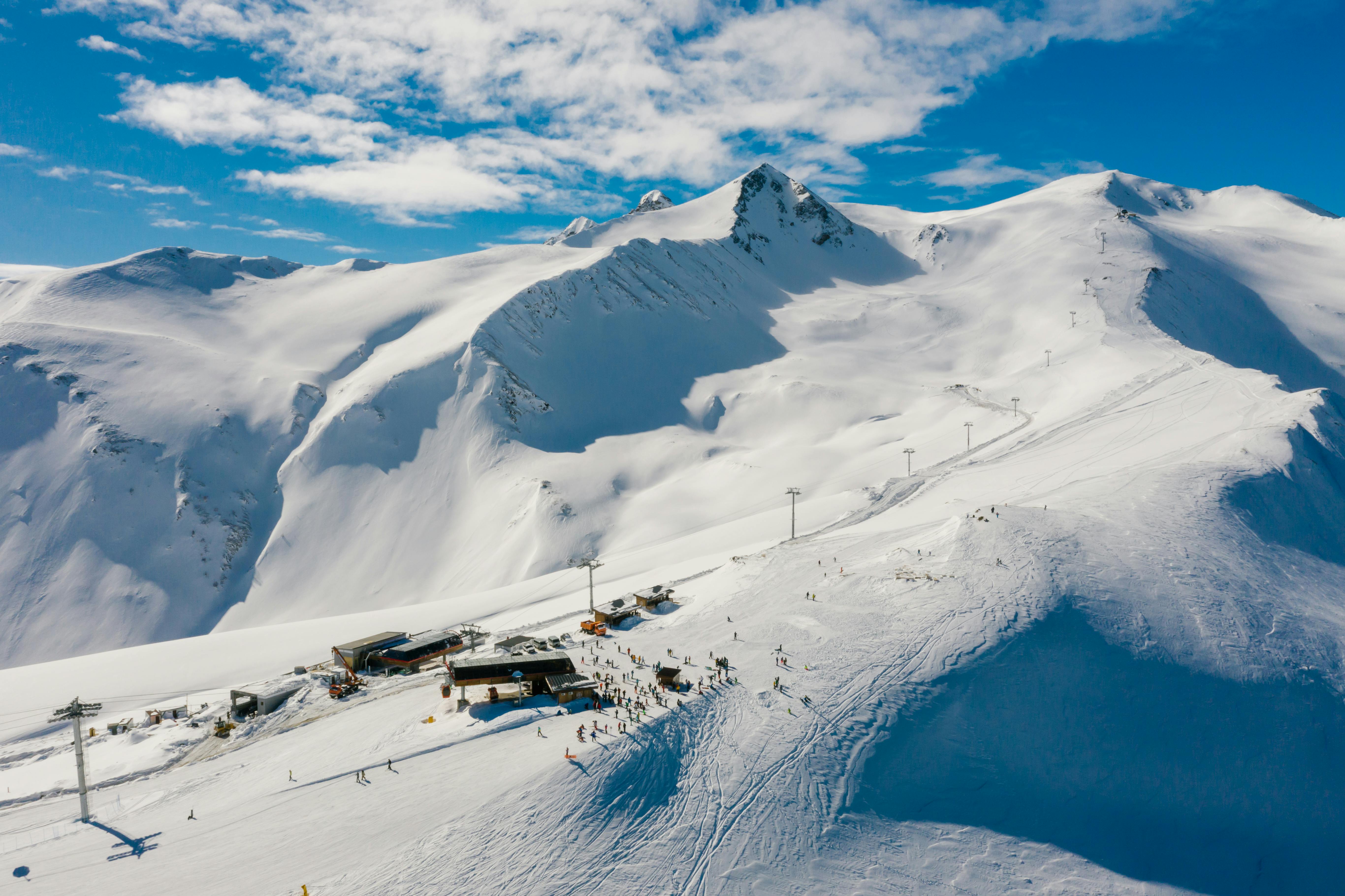 Prescription Goggle Inserts - Stunning aerial view of a snowy mountain ski resort during winter.