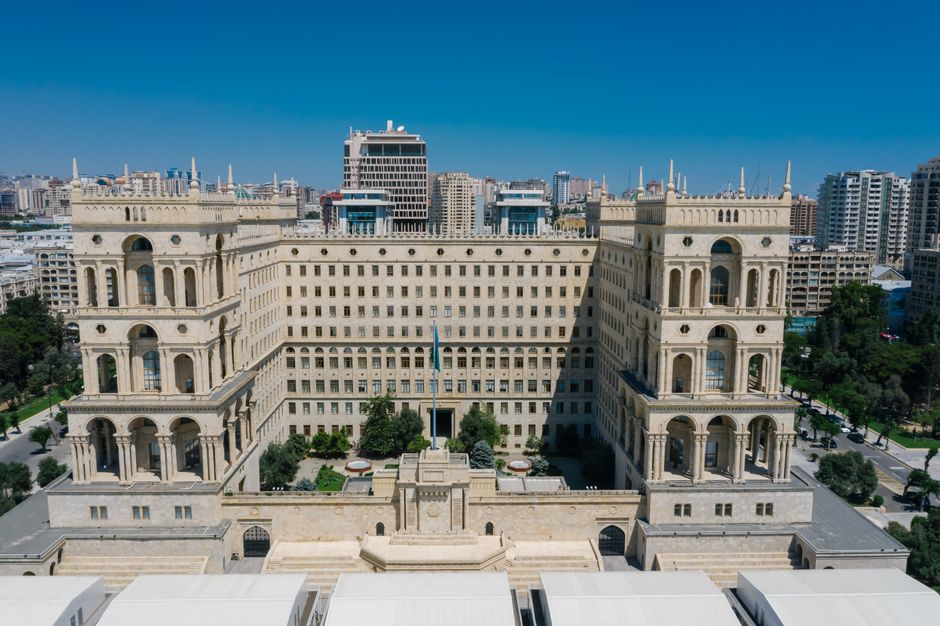 Aerial view of the Azerbaijan House of Government building in Baku, highlighting its grand architecture.