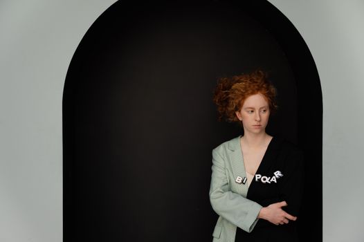 Woman in Green and Black Blazer