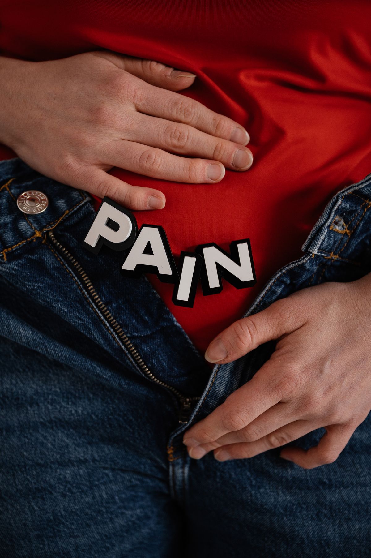 Doctor examining patient abdomen — appendicitis diagnosis