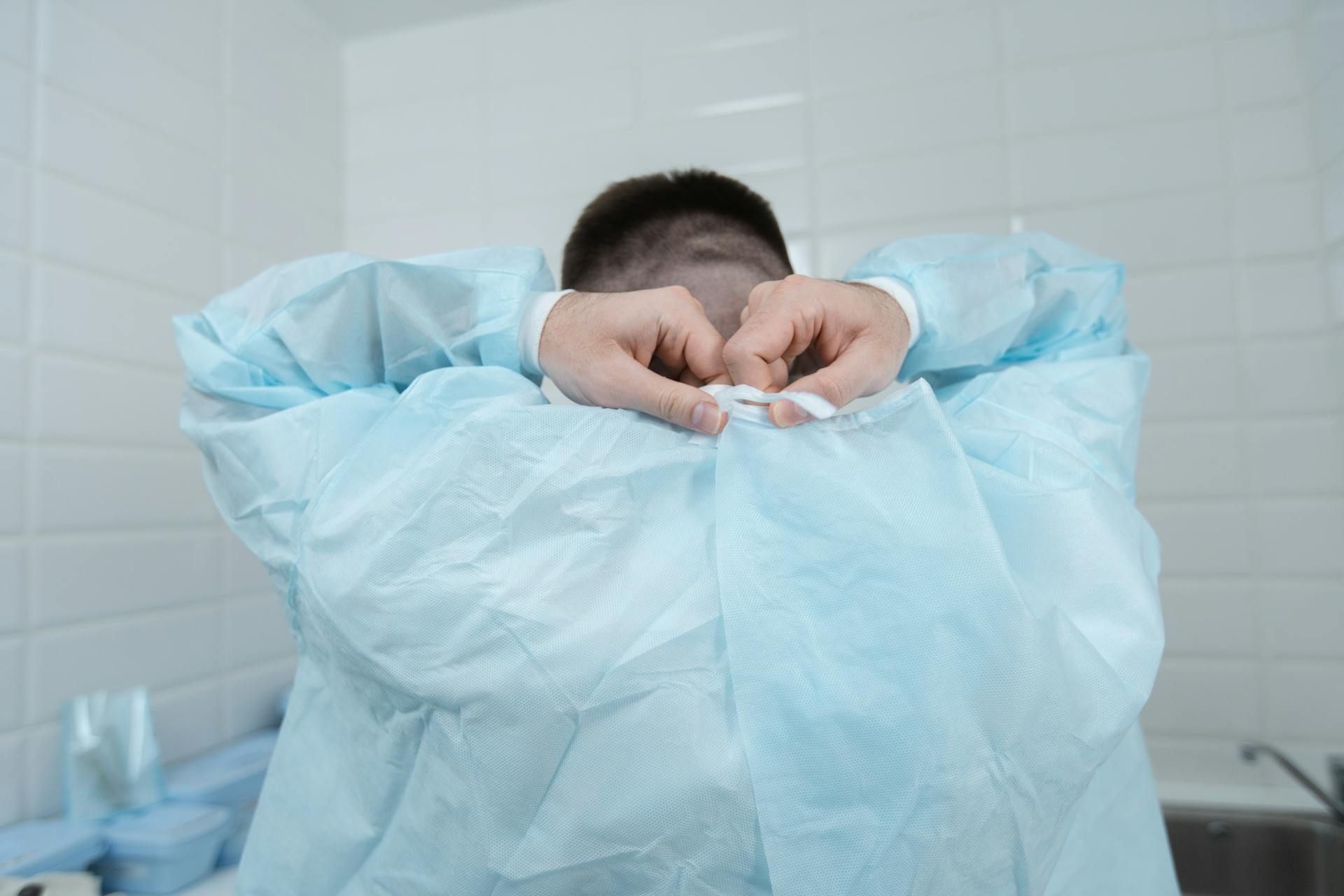 Backview of a Medical Practitioner wearing Scrub Suit