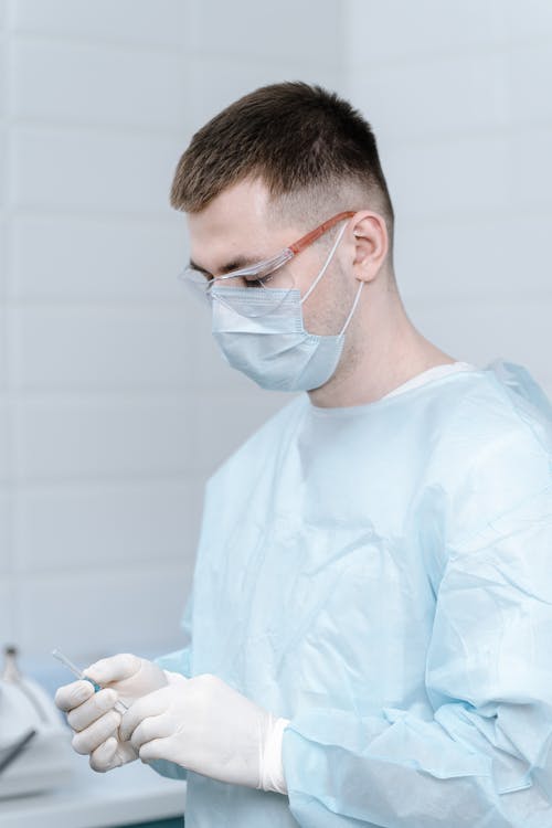 Man Wearing a Surgical Gown