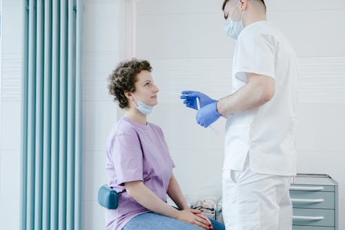 Free Woman Getting Covid Tested Stock Photo
