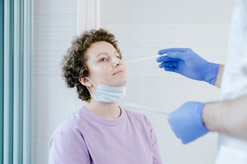 A Woman Getting a Swab Test