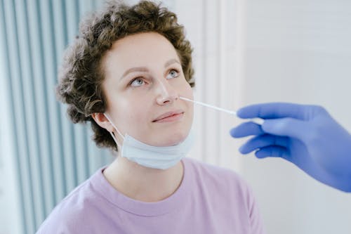 Woman Getting a Nasal Swab 