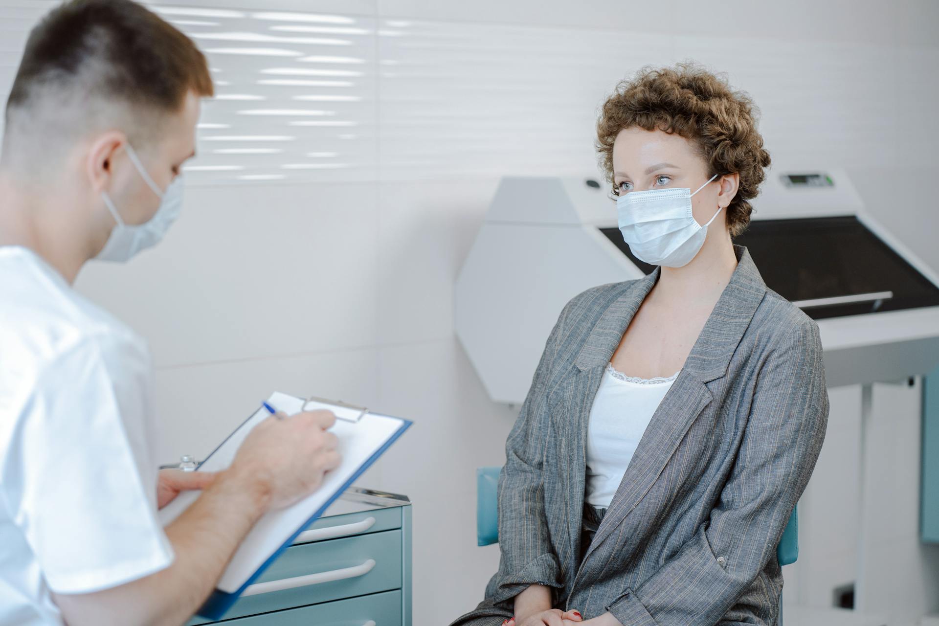 Doctor and Patient Talking in Office