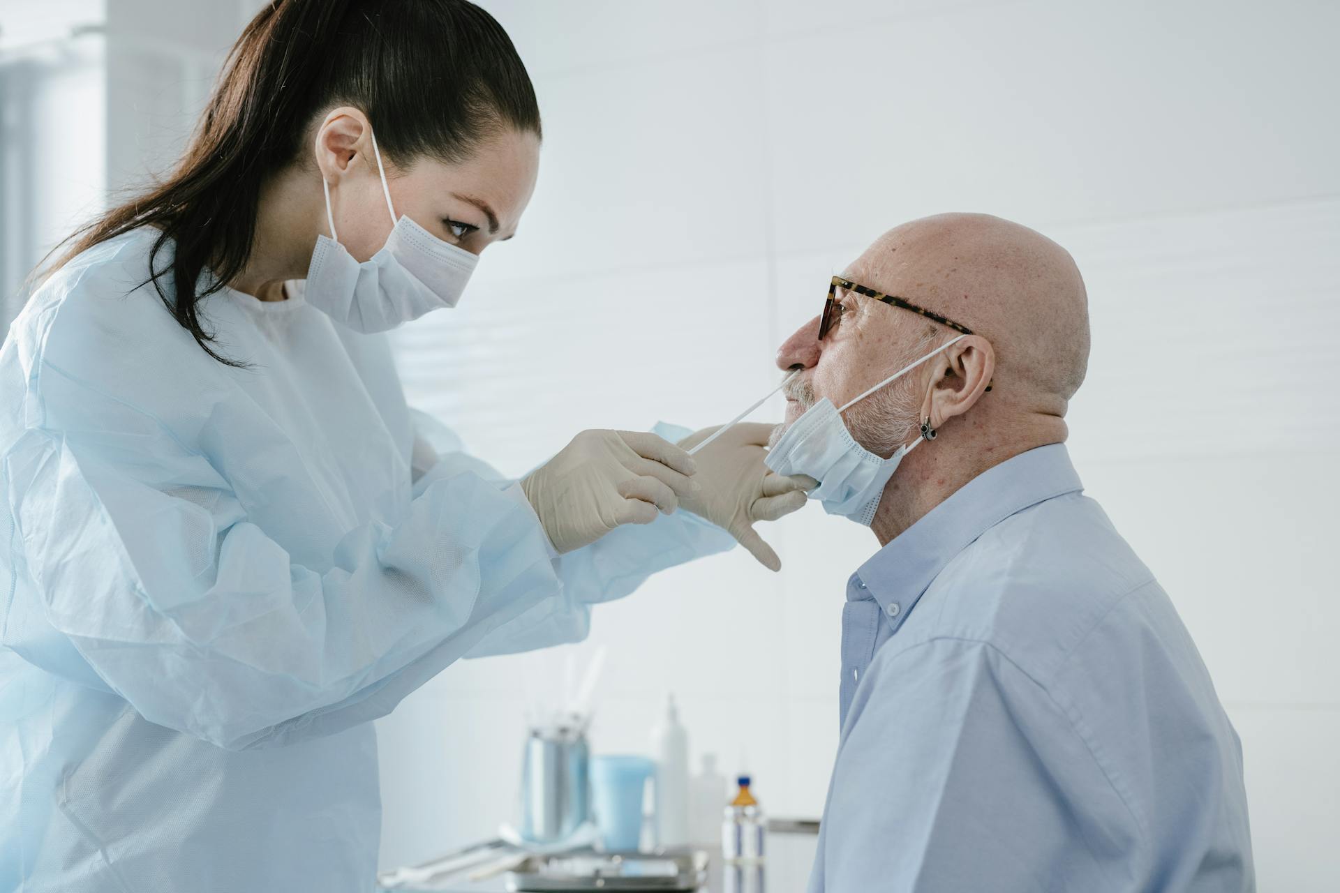 A Medical Professional Swabbing a Patient